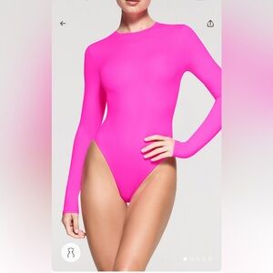 NWT FITS EVERYBODY LONG SLEEVE
CREW NECK BODYSUIT L  Fuchsia *RARE*